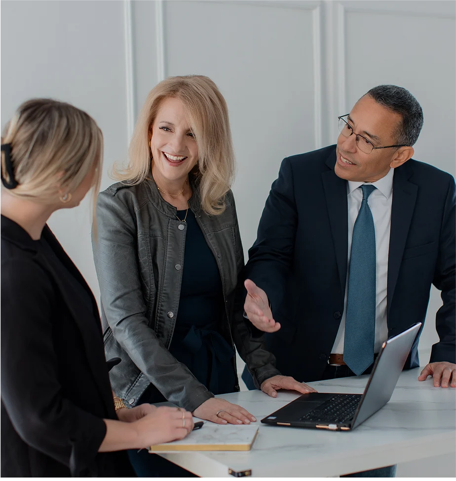 Caroline Stacey and Ray Stacey consulting with a client, strategizing business growth and digital transformation at Caroline Stacey & Co